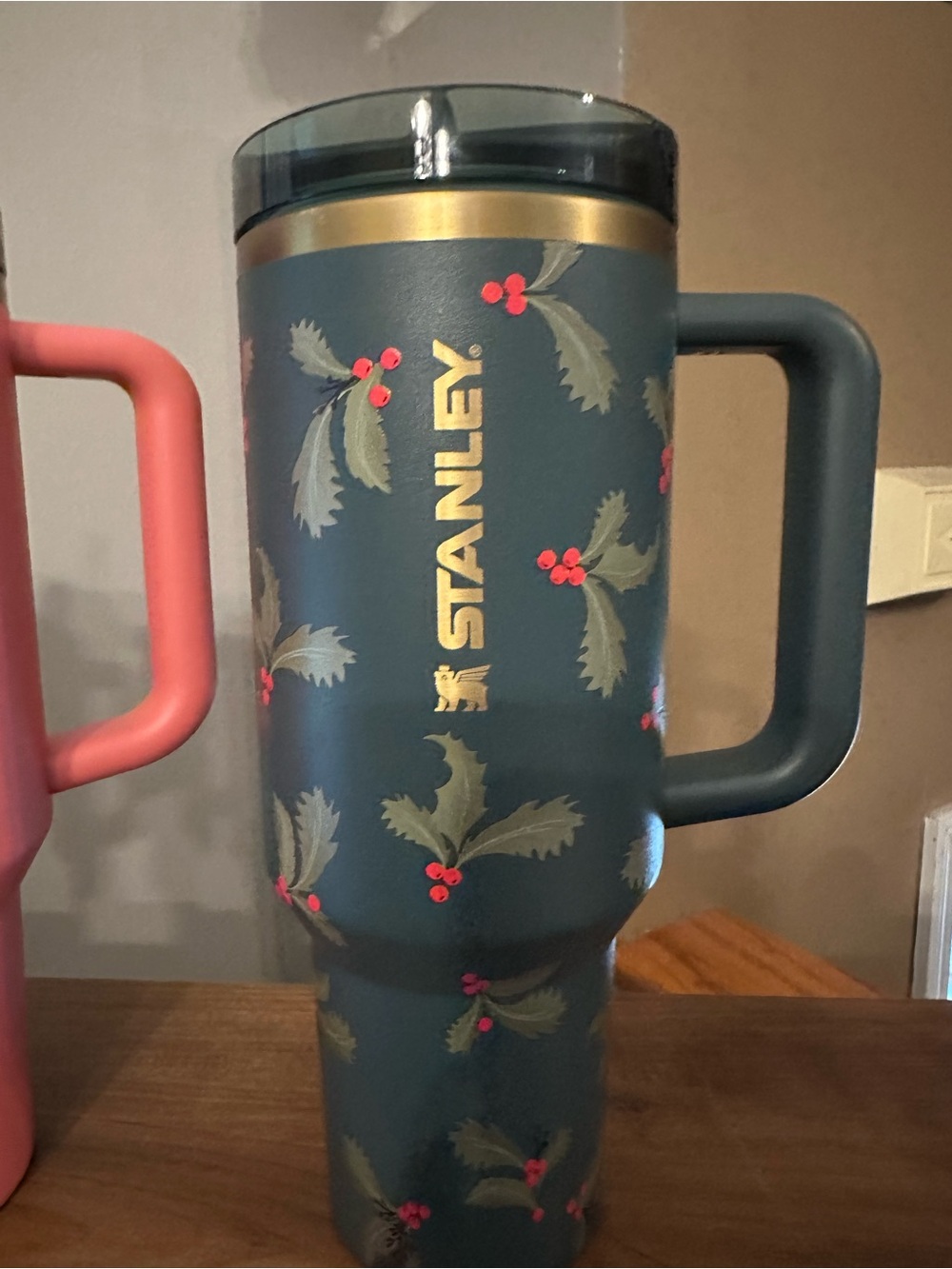 Stanley Dark Green Travel Tumbler with Gold Logo and Red Holly Accents